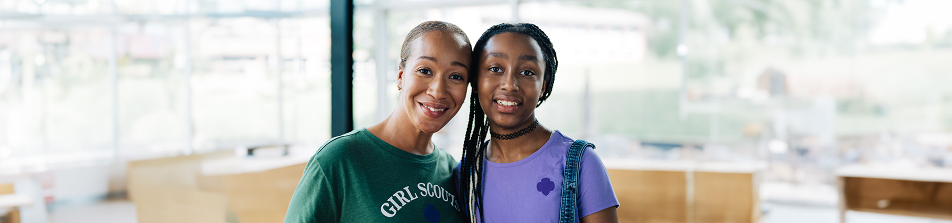  adult woman girl scout volunteer outdoors smiling 